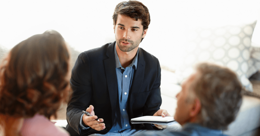 IPMI advisor explaining health insurance underwriting options to clients